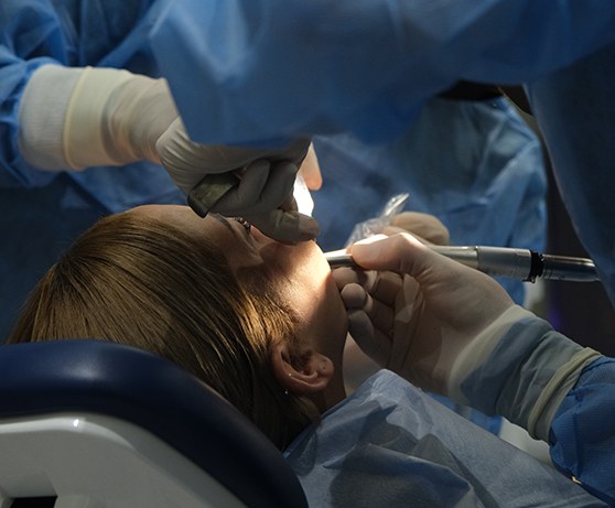 Woman undergoing a dental procedure
