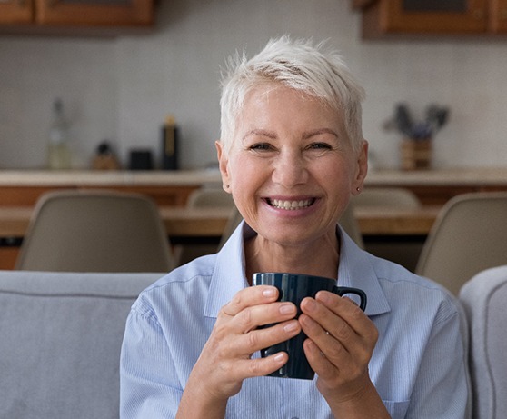 Woman smiling on a couch
