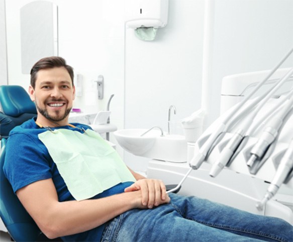 Smiling adult male dental patient